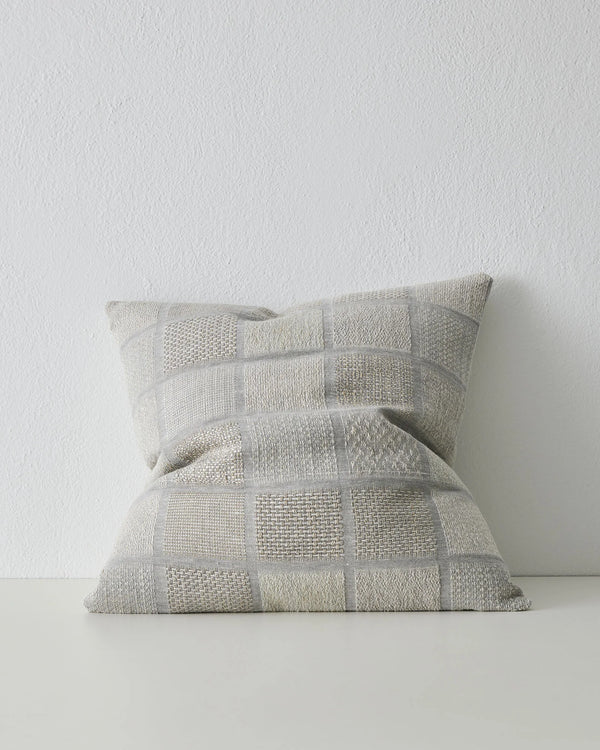 Bodrum Mist 50x50 linen cushion in soft blue-grey, featuring geometric checkerboard with mixed weave panels by Weave Home
