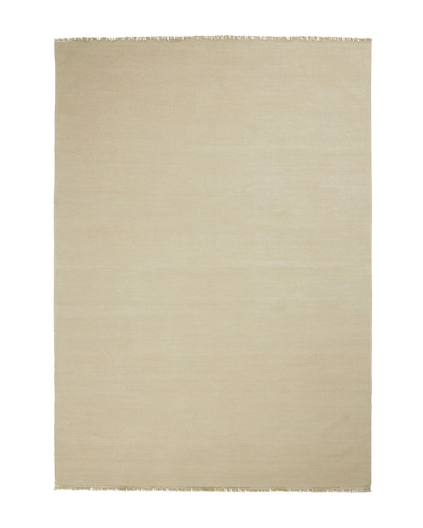 Emilio Canvas linen rug in soft beige-cream, flat-weave high-traffic design with frayed edge detail by Weave Home