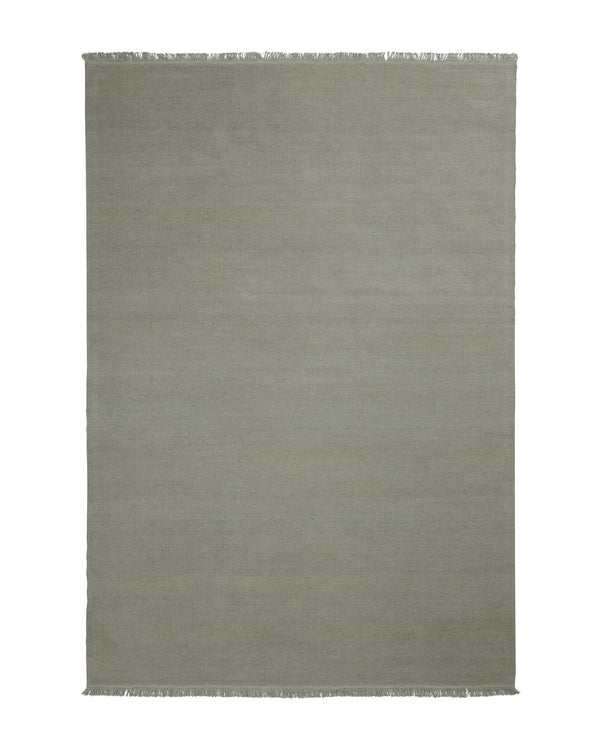 Emilio Flint linen rug in soft grey-blue, flat-weave construction with fringe border detail by Weave Home