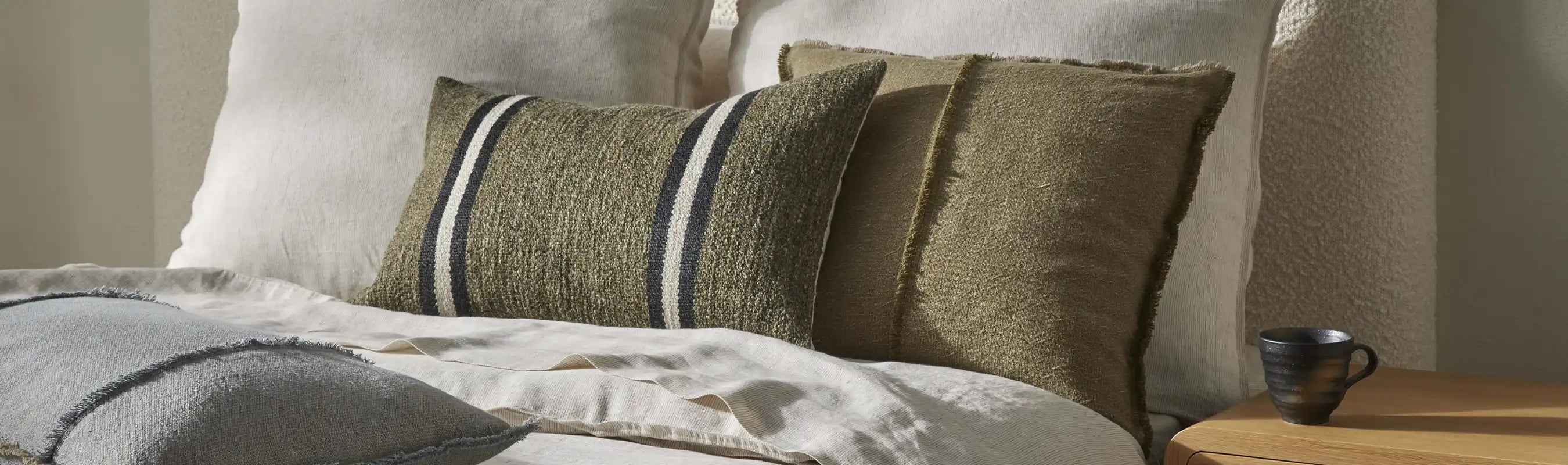 Cushion range on viscose wool rug.