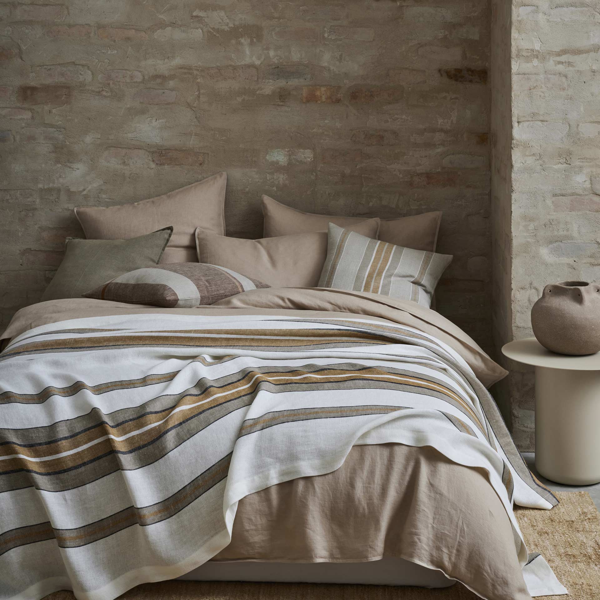 Cushion range on viscose wool rug.