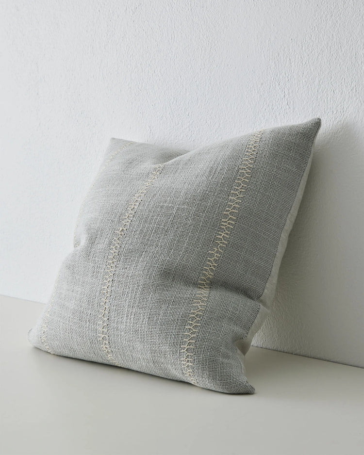 Maddalena Glacier cushion cover, 50x50cm, in natural white polyester linen blend with embroidered vertical stripe detail by Weave Home