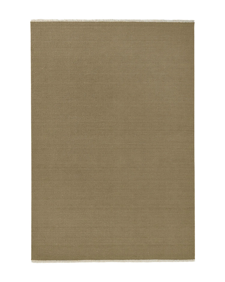 Fabien Nomad textured wool rug in sandy beige with chunky ribbed weave and cream fringe detail by Weave Home