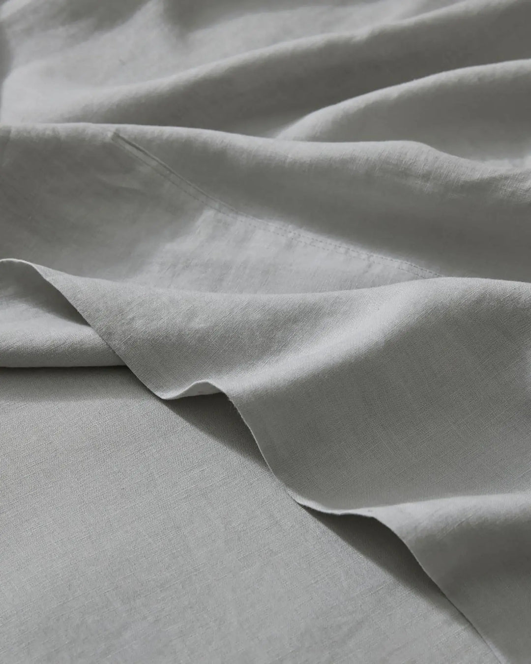Ravello Flat Sheet in silver, European linen with soft pre-washed finish, detail view by Weave Home