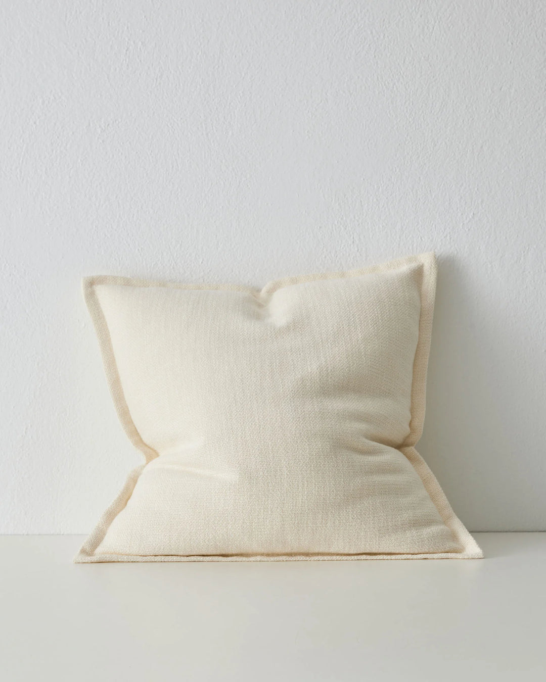 Figlio Pearl 50x50 woven polyester cushion with chunky linen-look texture and piped edges by Weave Home
