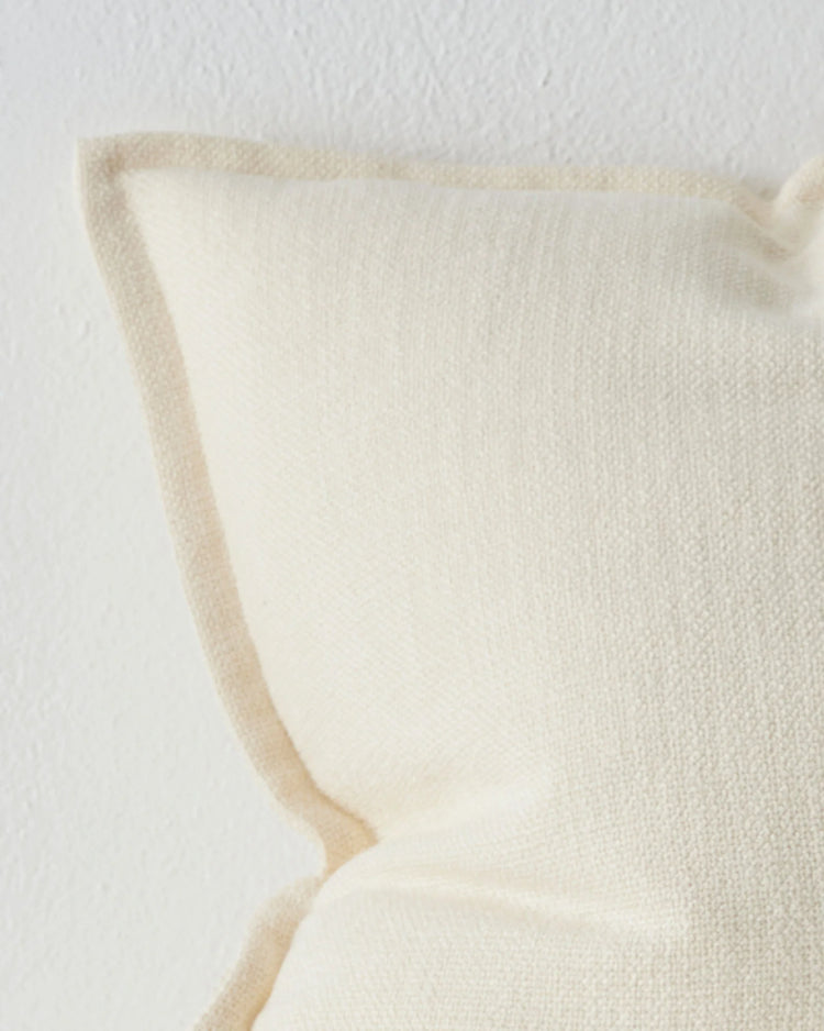 Figlio Pearl cushion cover 50x50cm, close-up of chunky woven polyester texture in soft white by Weave Home