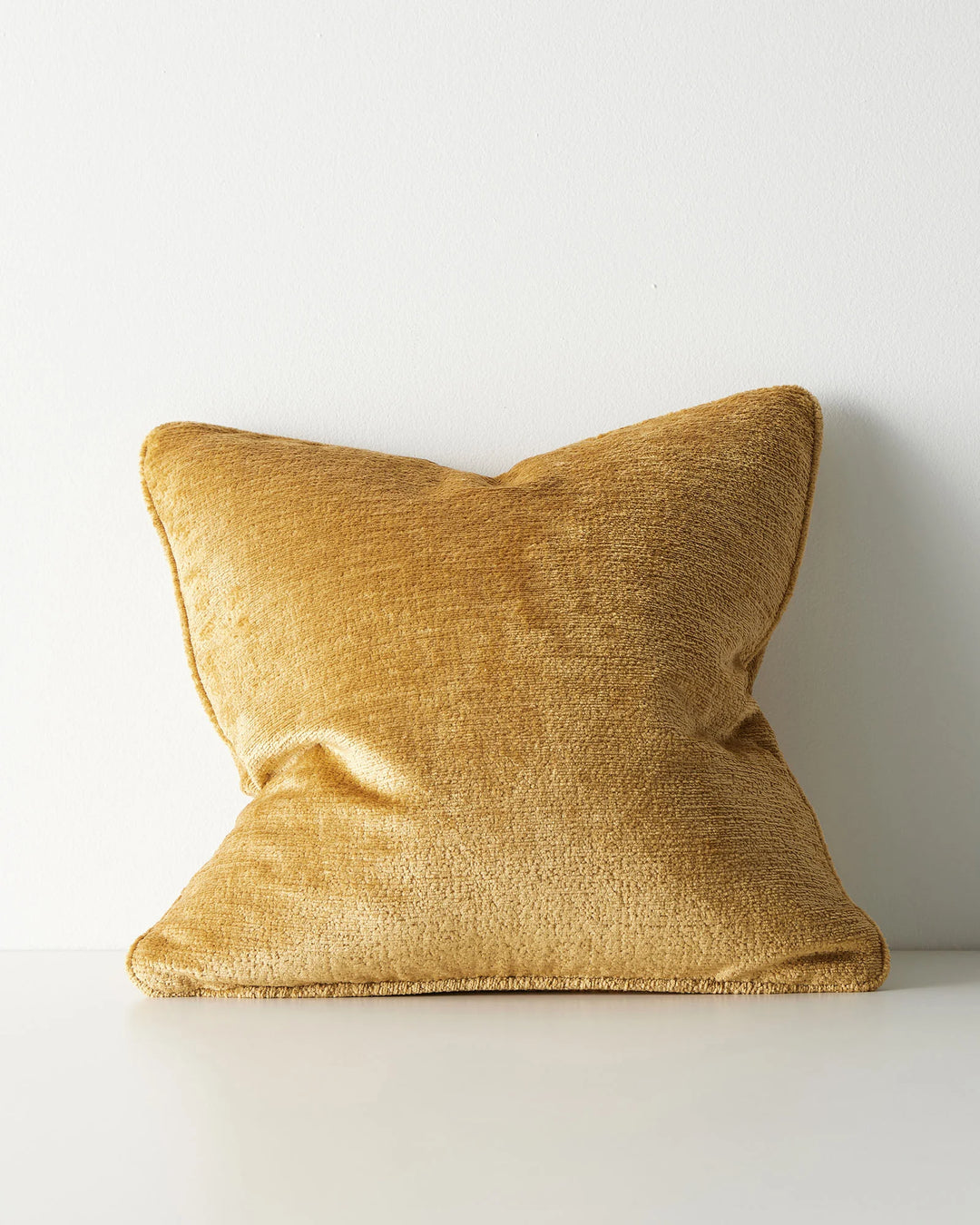 Tempo Manuka 50x50 cushion in golden honey polyester with chunky chenille texture and piped edging by Weave Home