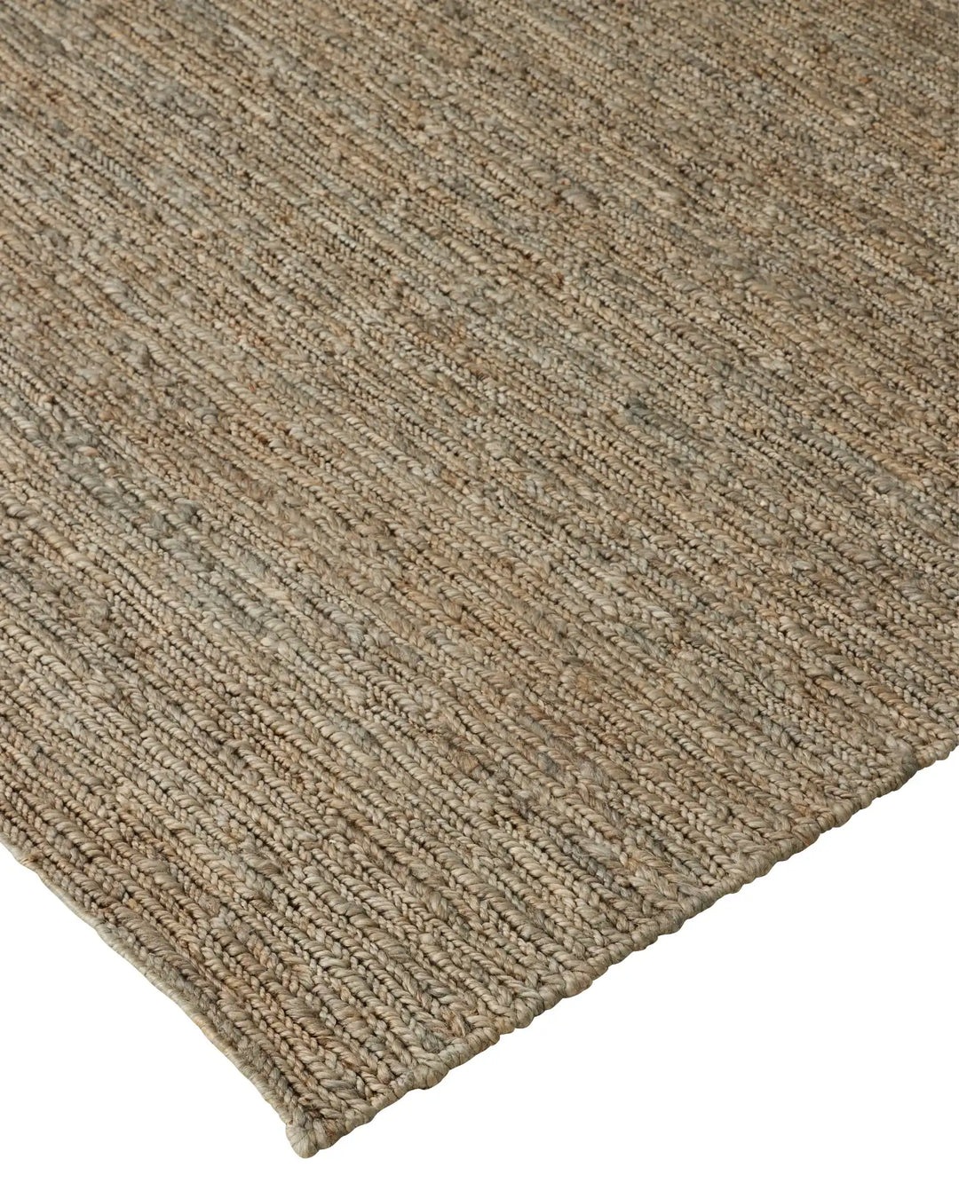Suffolk Mineral jute rug, close-up weave detail showing textured hand-woven construction in cool-toned brown with sage undertone by Weave Home