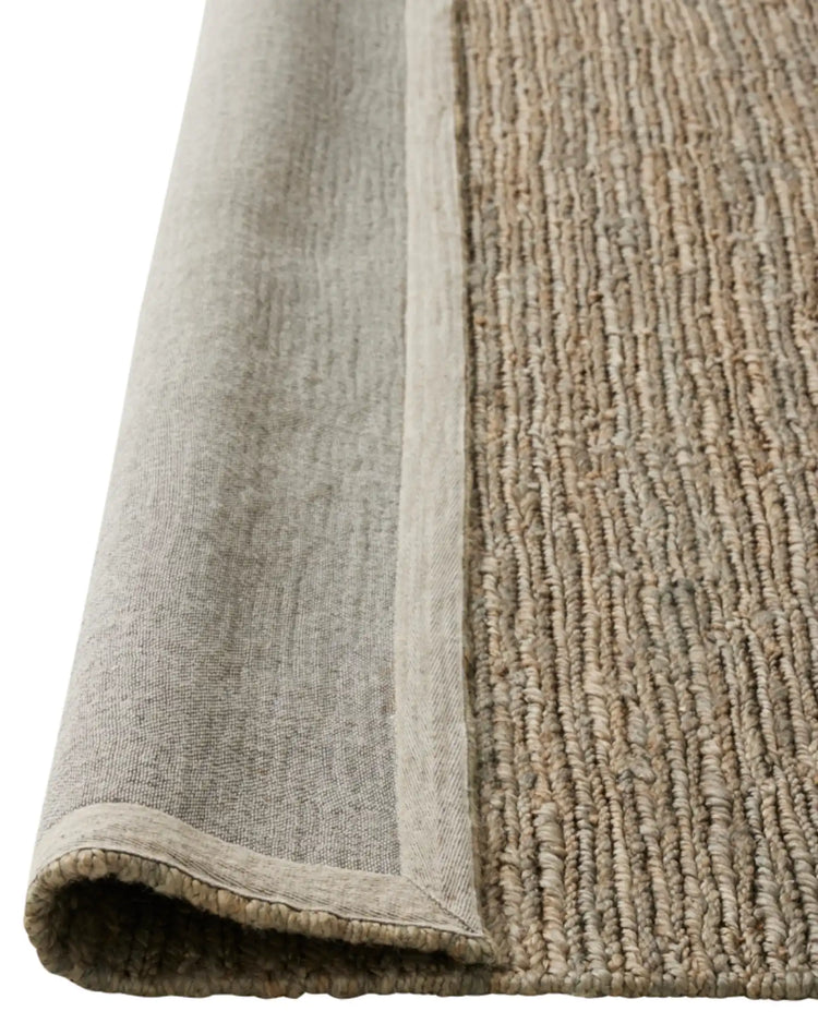 Suffolk Mineral textured jute rug detail showing hand-woven weave and cotton backing, 200x300cm by Weave Home