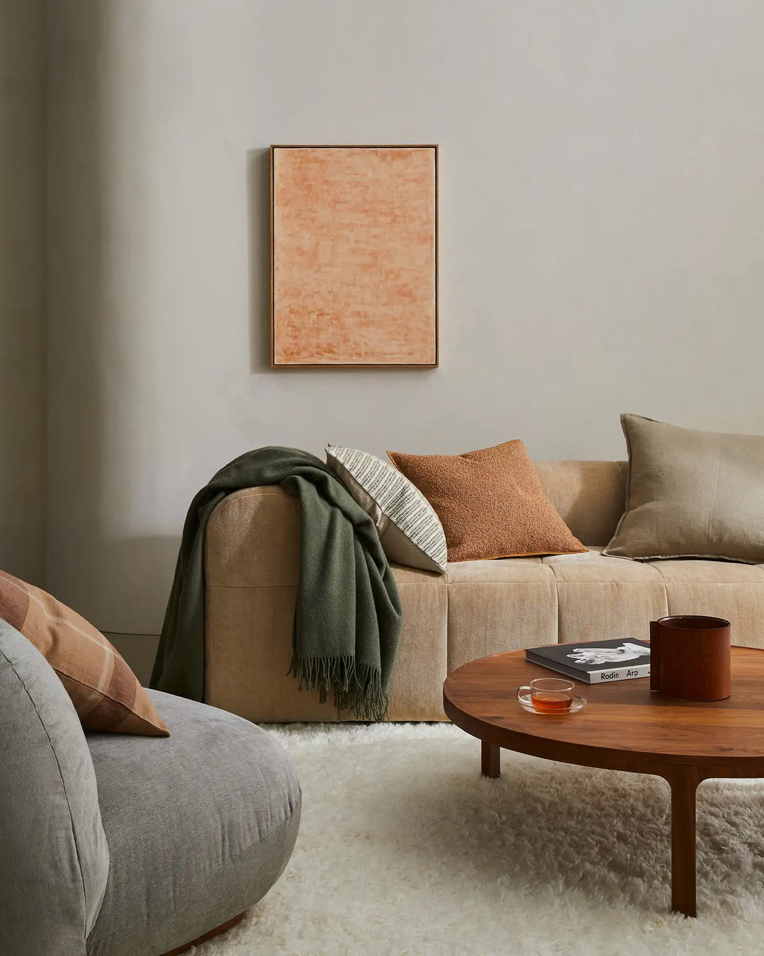 Alberto Copper bouclé cushion 50x50cm with soft-touch texture and babylock edge, styled on beige sofa by Weave Home