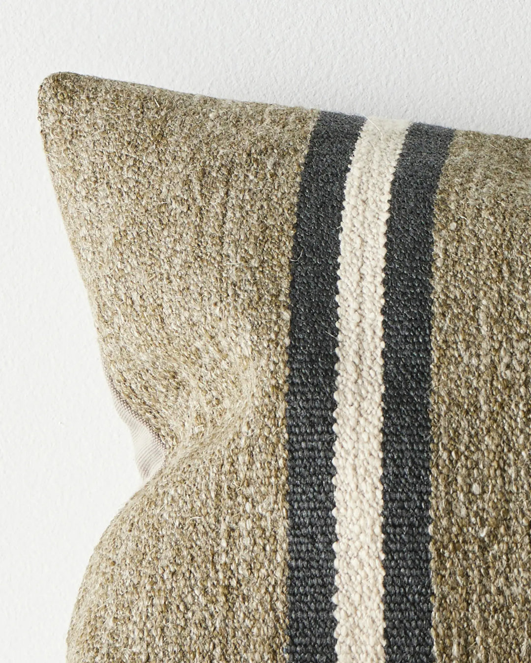 Mila Forest 40x60 lumbar cushion close-up, olive wool-linen blend with charcoal and cream stripe detail by Weave Home