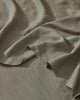 Ravello Flat Sheet in Caper, close-up detail of soft European linen weave with rolled selvage edge by Weave Home