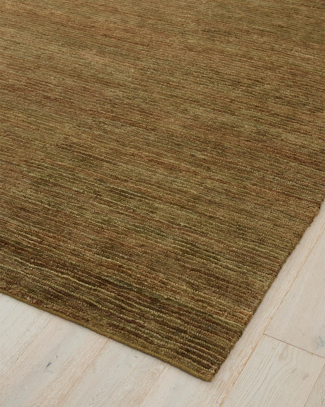Bastian Oakmoss rug corner detail, textured 200x300 jute with looped and cut pile design by Weave Home