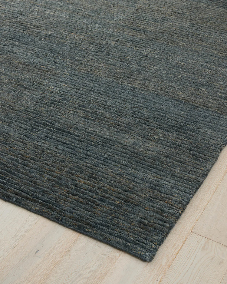 Bastian Dusk textured jute rug in charcoal blue, 200x300cm, with linear looped and cut pile detail by Weave Home