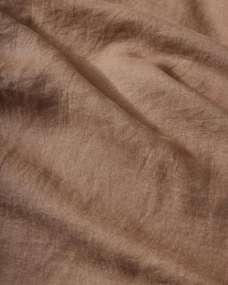 Ravello Flat Sheet in Biscuit, close-up detail of European linen weave texture with soft, relaxed finish by Weave Home