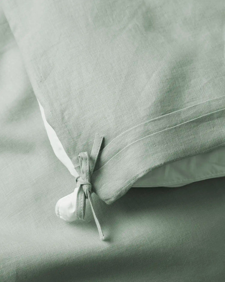 Ravello Quilt Cover in Sage, close-up of internal tie detail securing quilt, European linen by Weave Home