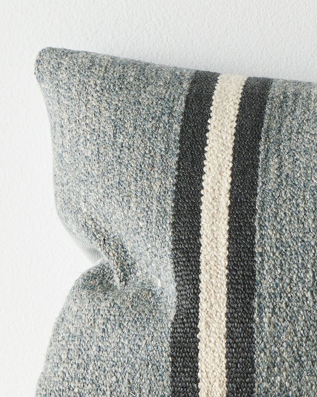 Mila Horizon cushion close-up showing wool-linen blend texture with charcoal and cream stripe detail by Weave Home