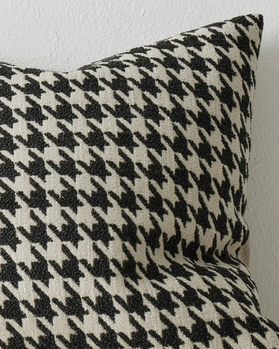 Giovanni Midnight cushion front view, black and white houndstooth bouclé viscose blend 50x50cm by Weave Home