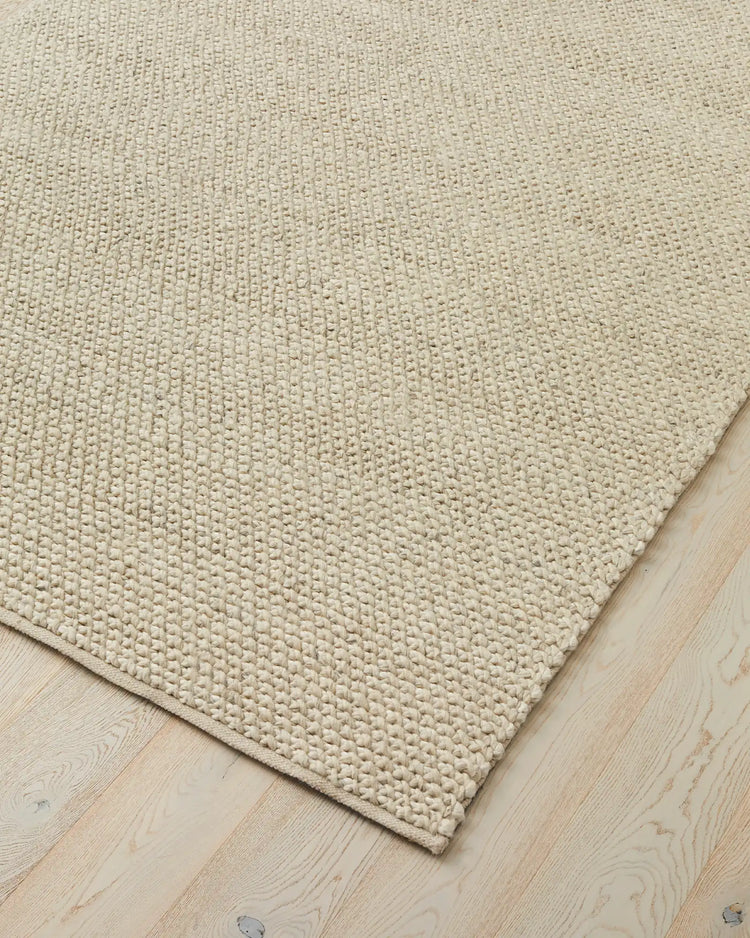Emerson Seasalt woven rug corner detail, warm off-white NZ wool and viscose with textured weave, by Weave Home