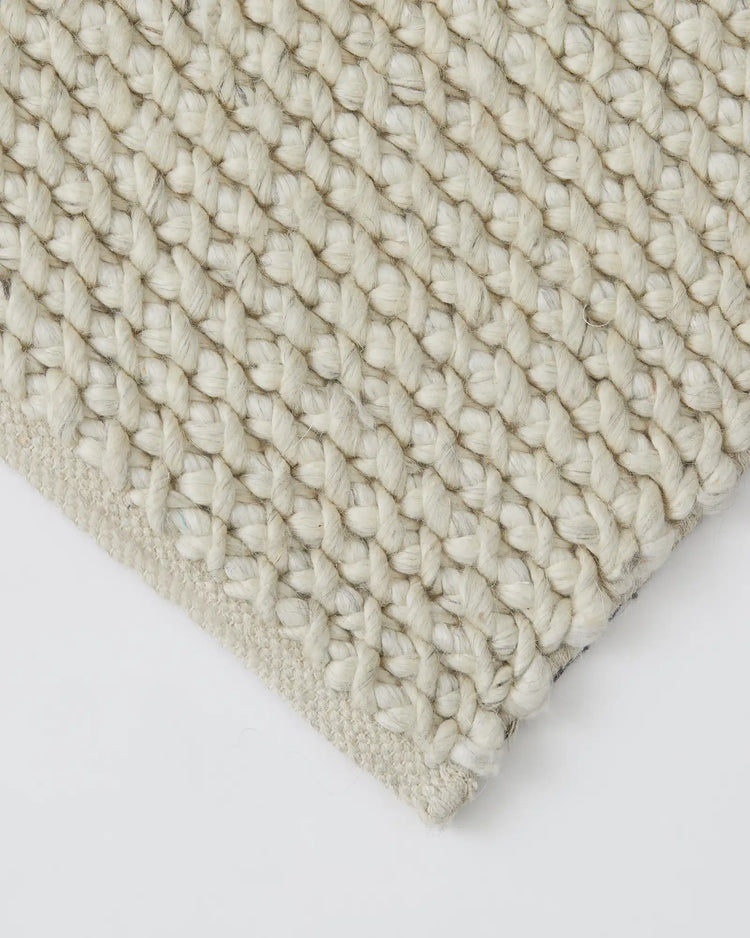 Emerson Seasalt rug detail view, showing thick woven NZ wool and viscose threads in warm off-white, textured low-traffic rug by Weave Home