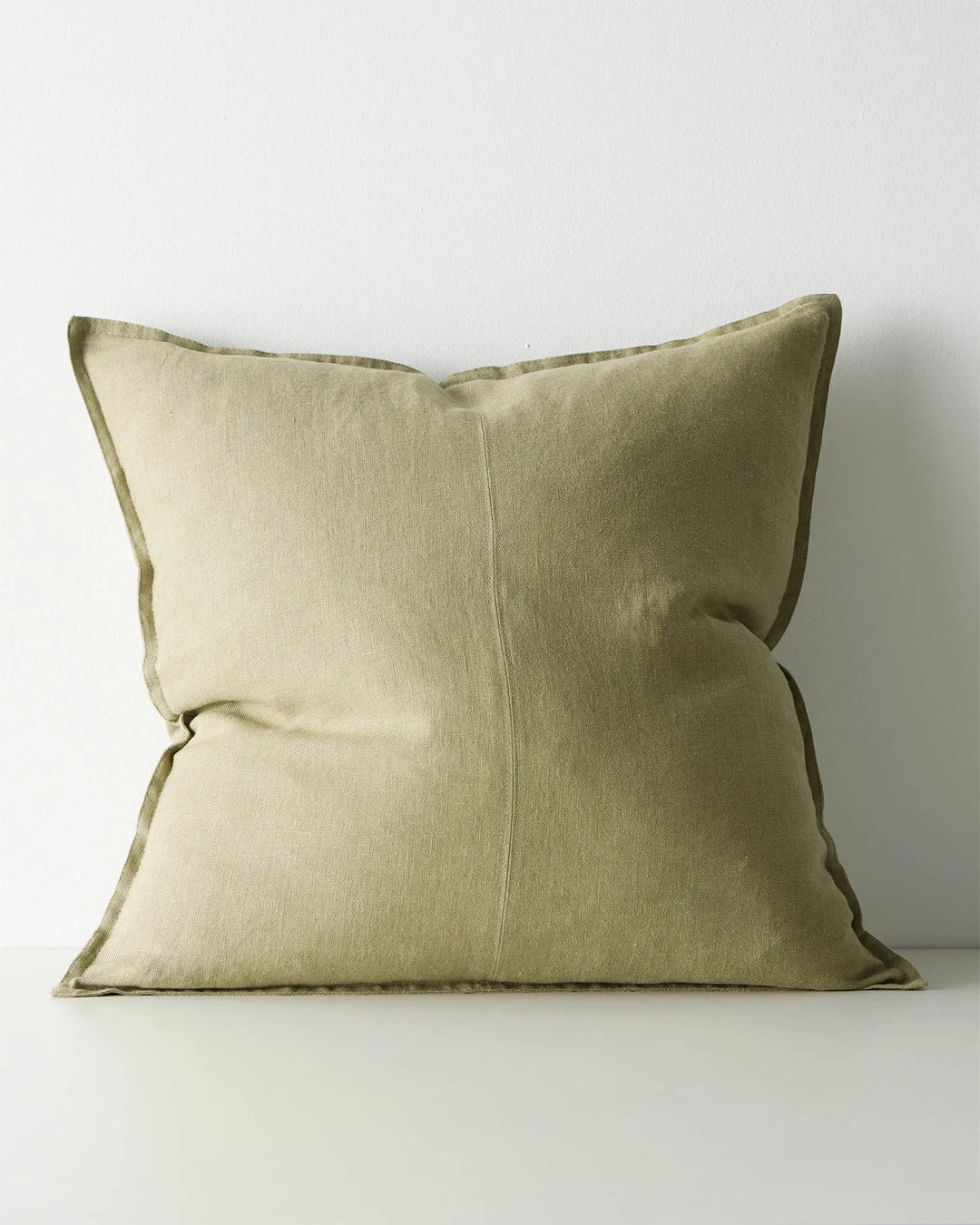 Como Willow 60x60 linen cushion in soft green with self-piping detail, stonewashed European linen by Weave Home