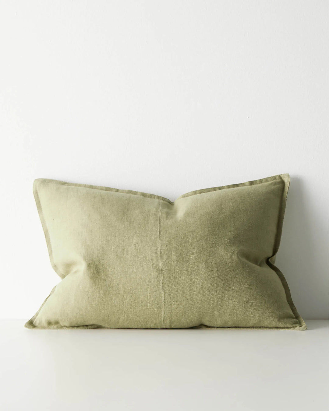 Como Willow linen cushion 40x60cm in soft green, stonewashed European linen with piped edges by Weave Home