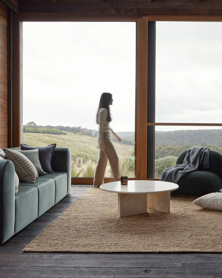 Suffolk Natural textured jute rug 200x300cm in golden brown, hand-woven with cotton backing, styled in modern living space by Weave Home