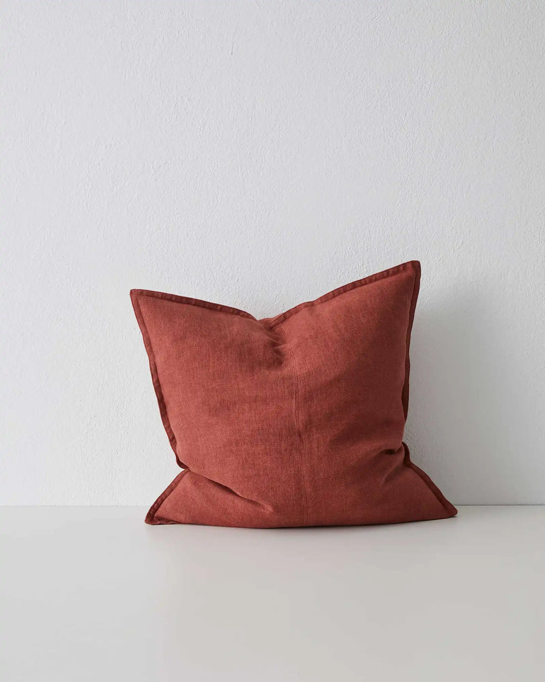 Como Sienna linen cushion, 50x50cm, burnt red stonewashed European linen with piped edge detail by Weave Home