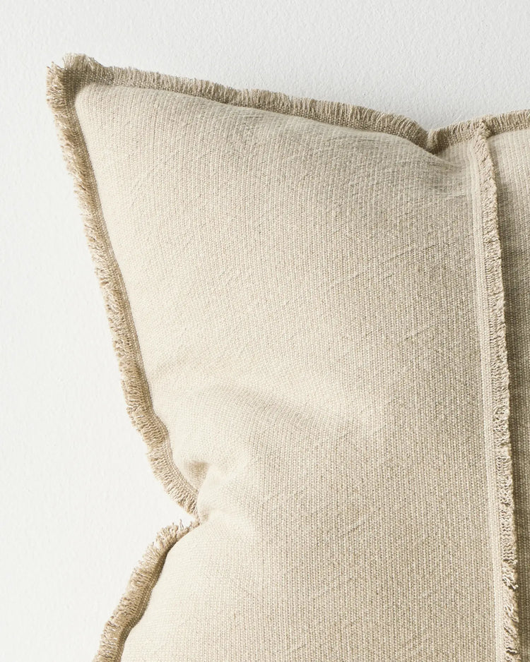 Adela Cashmere cushion detail showing raw-edge fringe border on cotton linen blend fabric by Weave Home