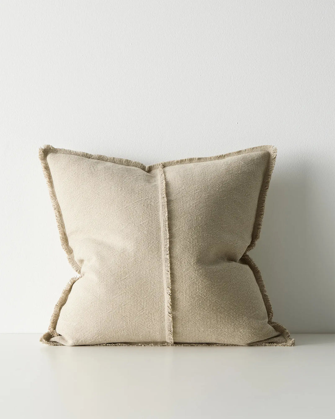 Adela Cashmere cotton linen cushion with raw-edged fringe border, textured weave and two-tone finish by Weave Home