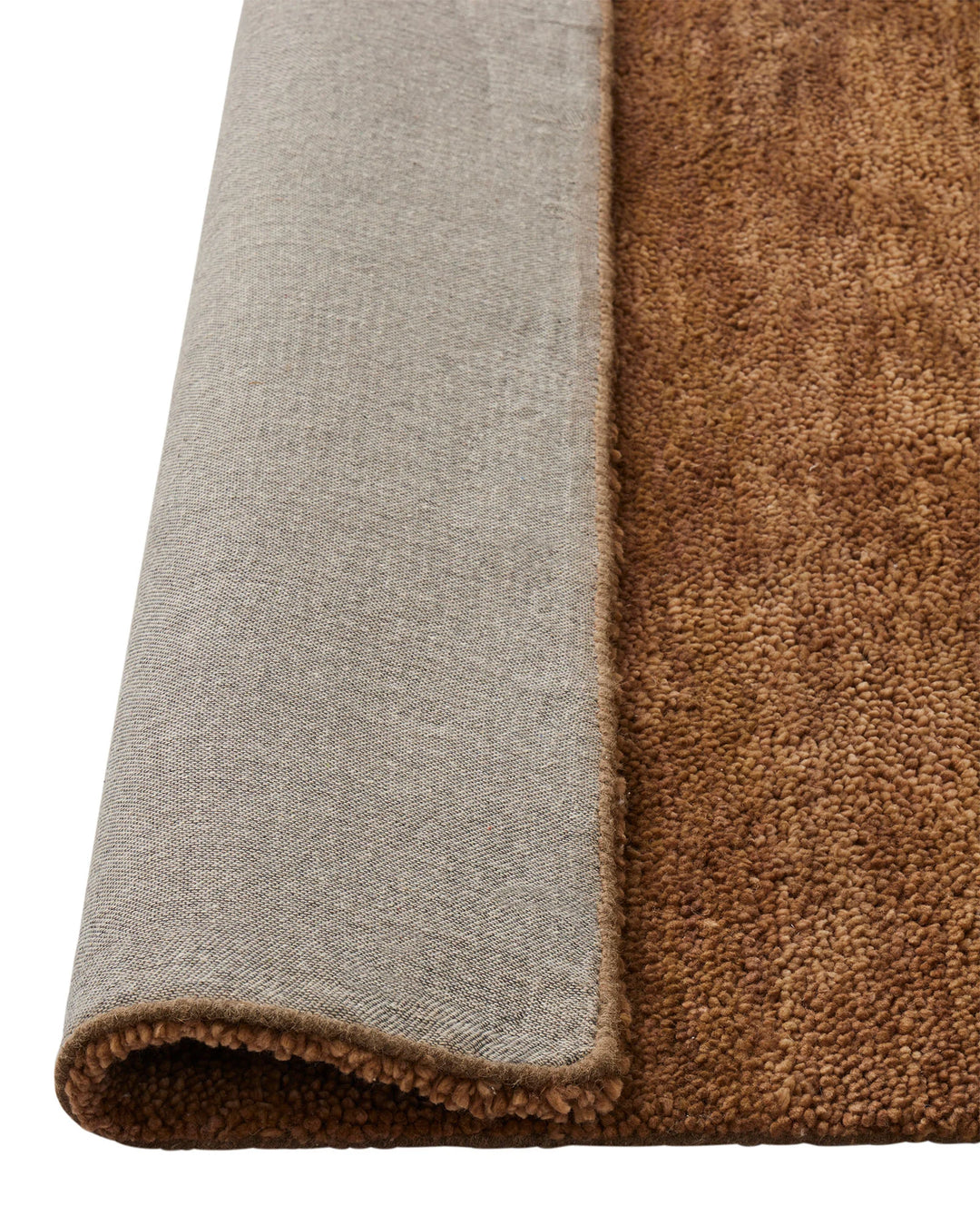 Valencia Toffee wool rug detail showing plush woven texture and bound edge close-up by Weave Home