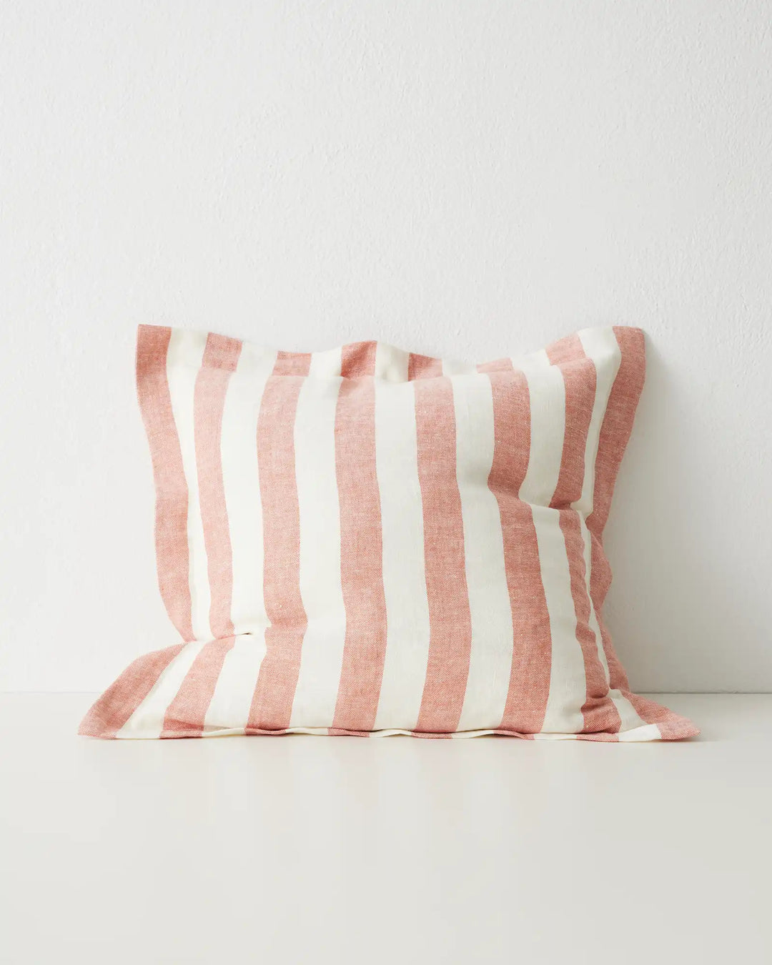 Vito Coral 50x50 linen cushion with bold vertical stripe pattern in coral pink and cream, stonewashed finish by Weave Home