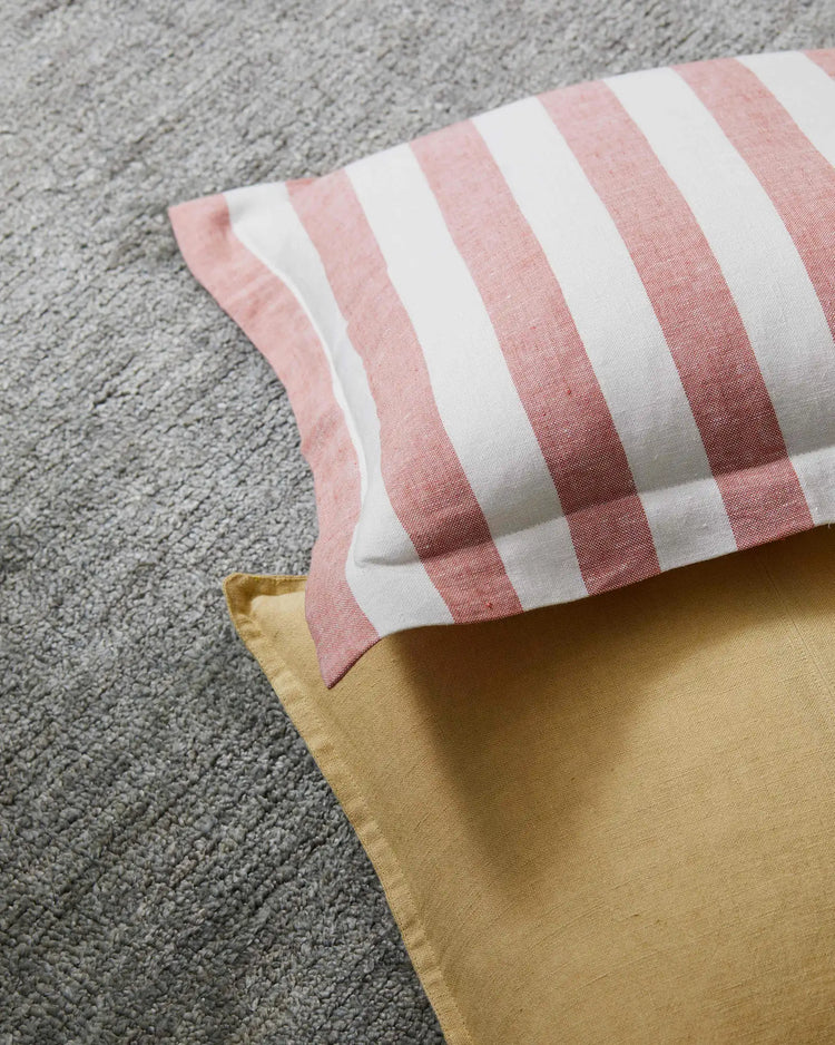 Vito Coral linen blend cushion, 50x50cm, featuring yarn-dyed pink and white stripes with stonewashed finish by Weave Home