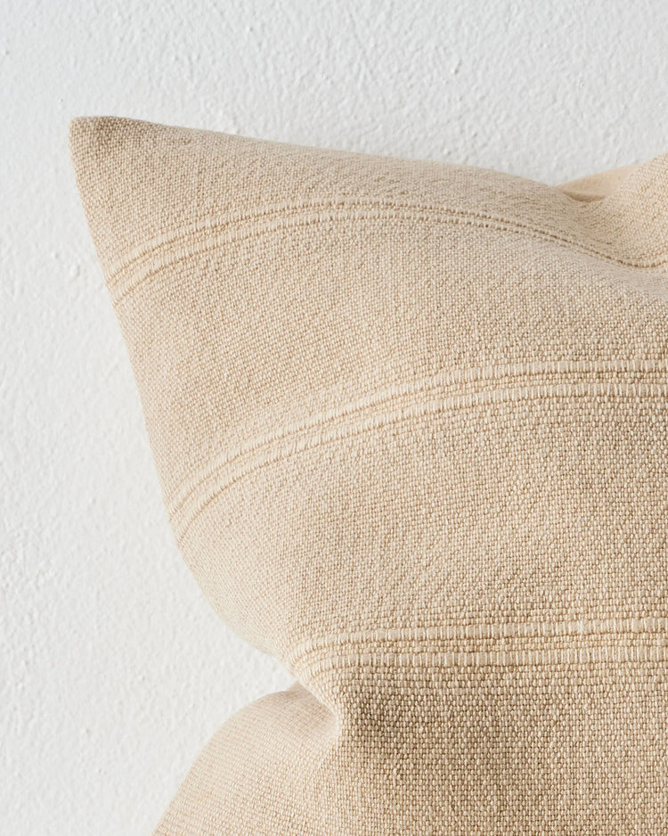 Palma Shell cushion close-up detail showing subtle ribbed pattern in warm neutral cotton linen blend fabric by Weave Home