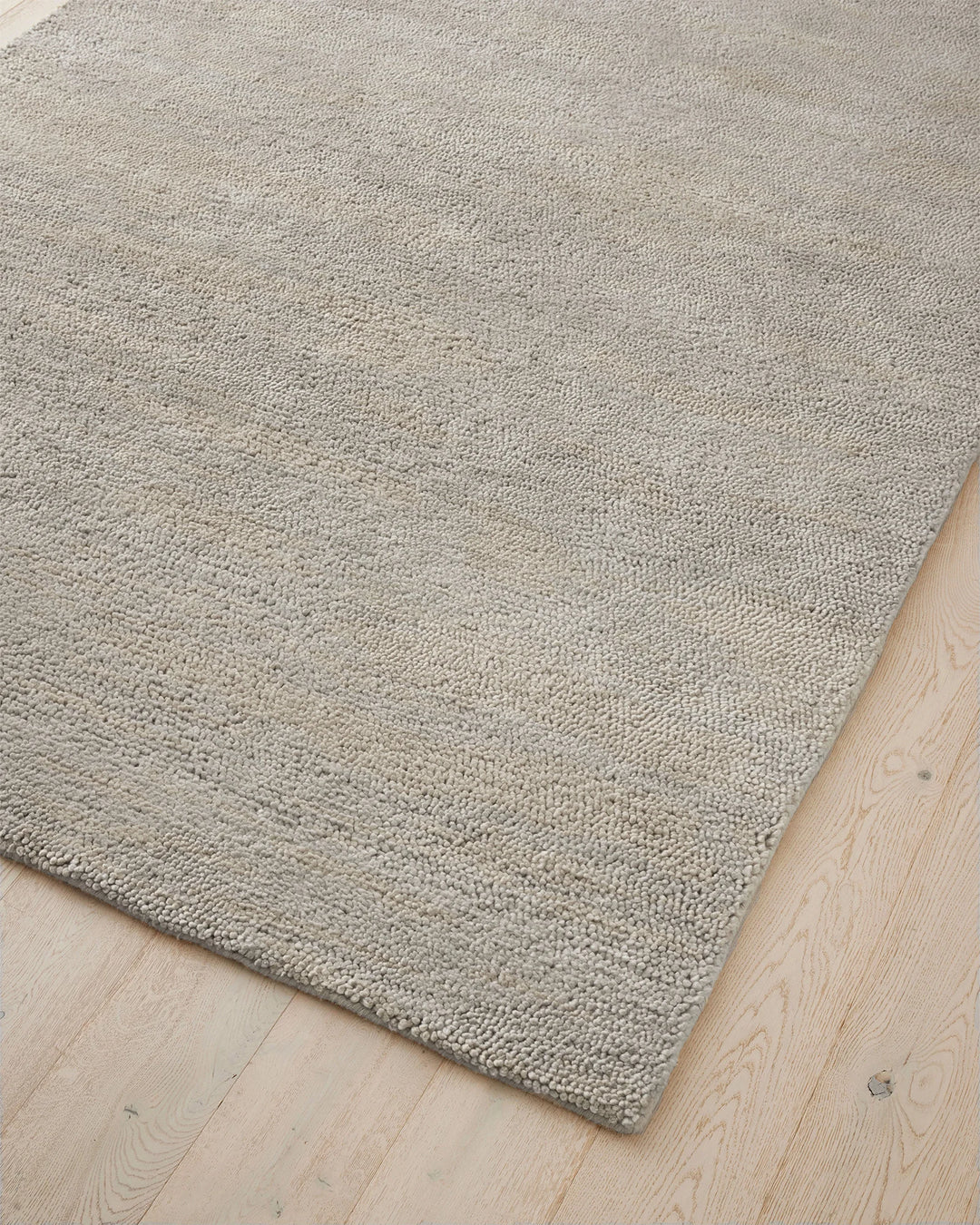 Valencia Cloud rug in light grey, corner detail showing plush woven NZ wool texture by Weave Home