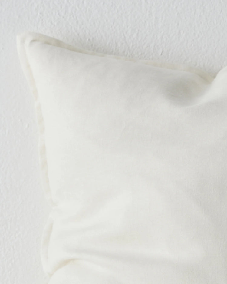 Fiore Salt cushion close-up detail, showing soft linen viscose blend fabric with luminous sheen and refined off-white finish by Weave Home