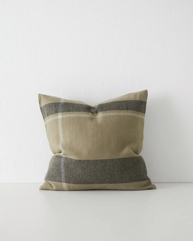 Dante Caper linen cushion in soft green placement check, 50x50cm, with charcoal and cream striped detail by Weave Home