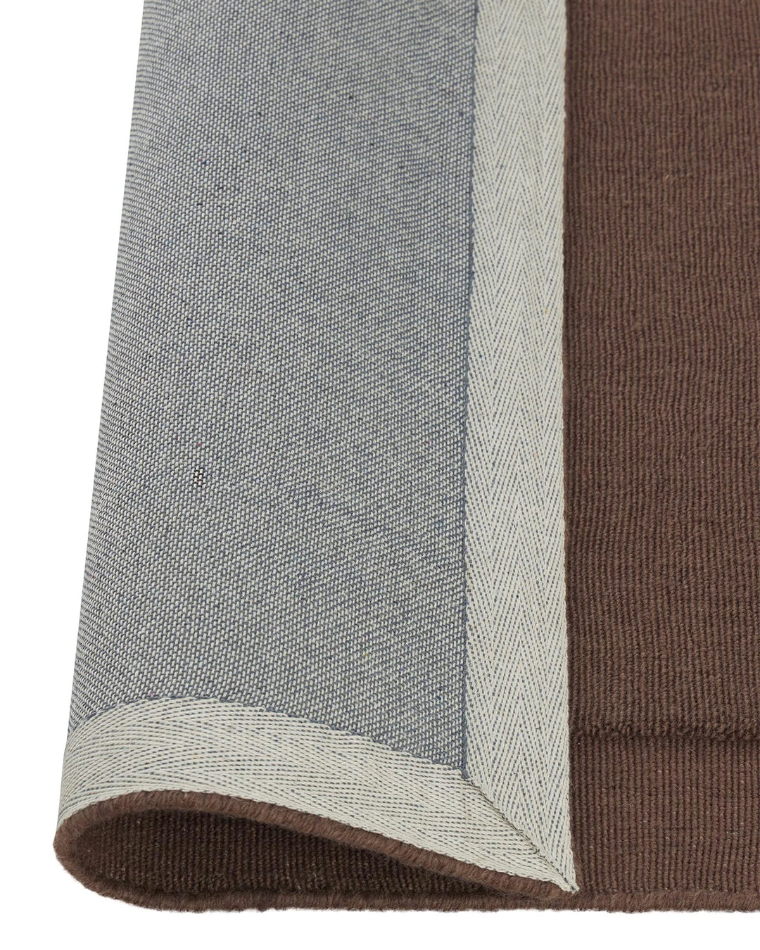 Cassio Mulberry rug, 100% NZ wool loop pile with contrasting serged edge and lowered border detail, by Weave Home