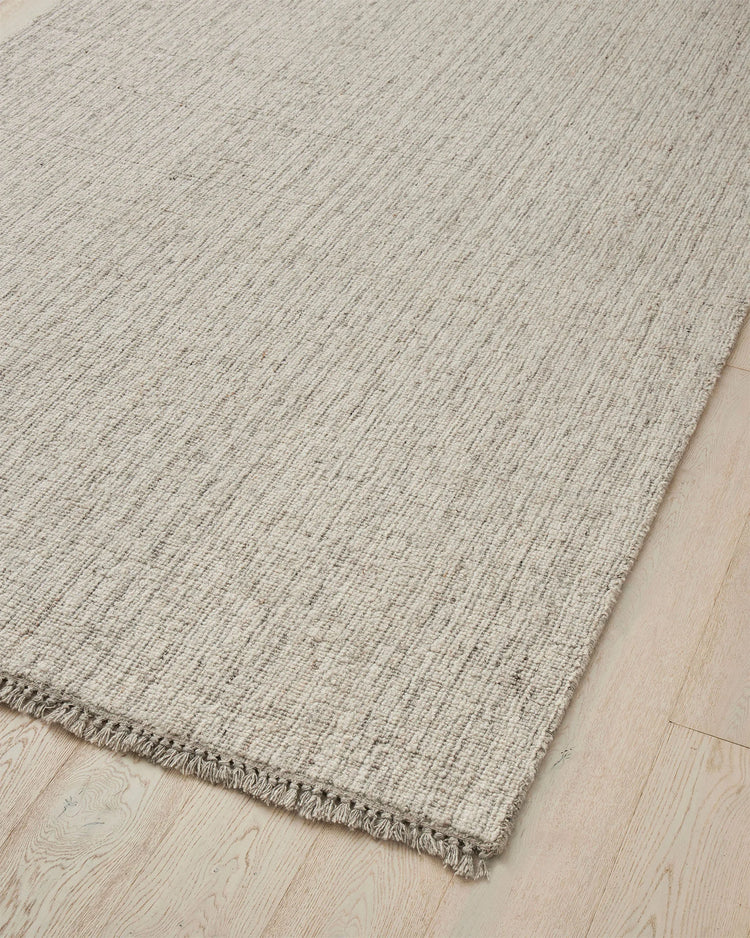 Puglia Fox textured woven rug in ivory with grey tones, chunky wool blend weave with fringe border, by Weave Home