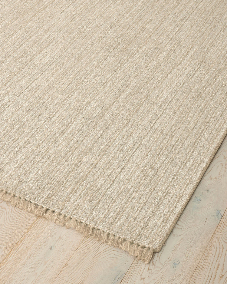 Puglia Hemp textured rug in beige with chunky woven design and fringe edge detail, by Weave Home