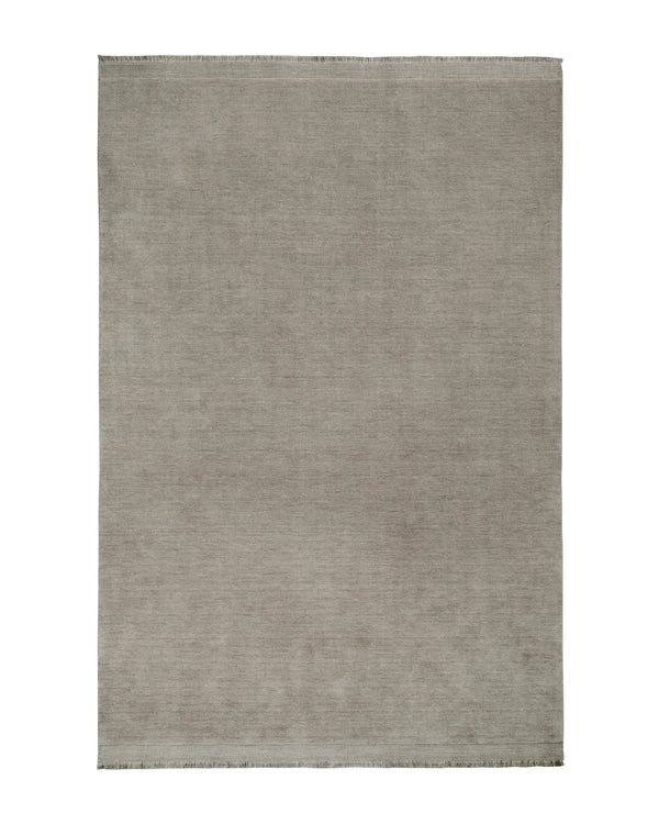 Silvio Flint hand-woven rug in warm grey with micro fringe border detail, sustainable styling by Weave Home