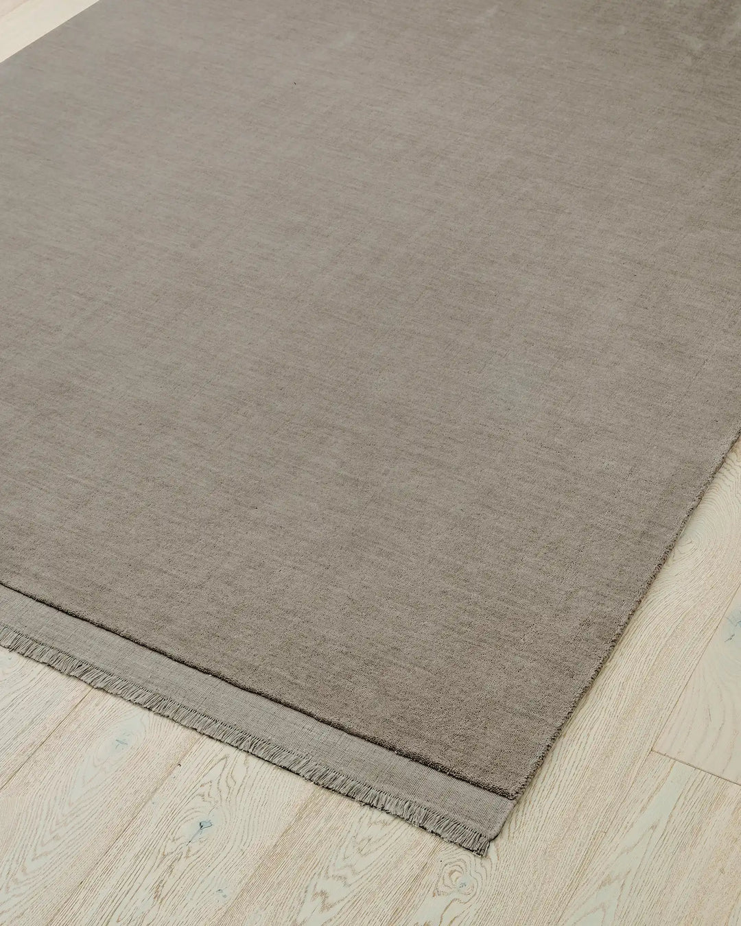 Silvio Flint rug in warm grey, 3m x 4m, featuring micro fringe border detail and hand-woven texture by Weave Home
