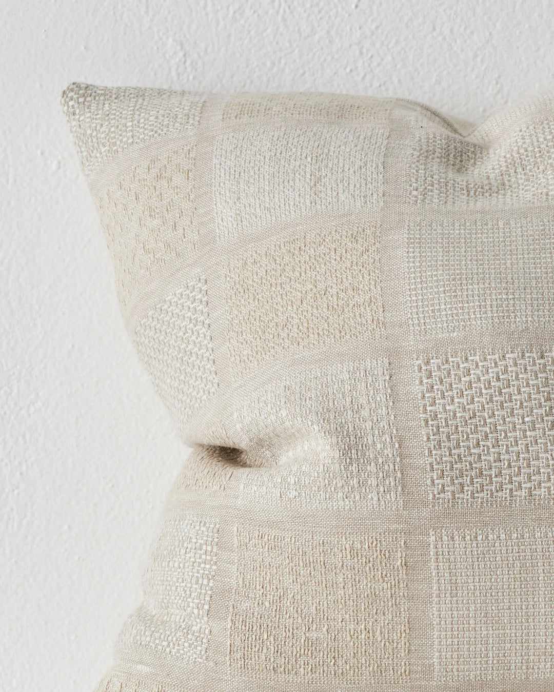Bodrum Hemp 50x50 cushion close-up, linen cotton blend with geometric checkerboard weave panels in stone and taupe, by Weave Home