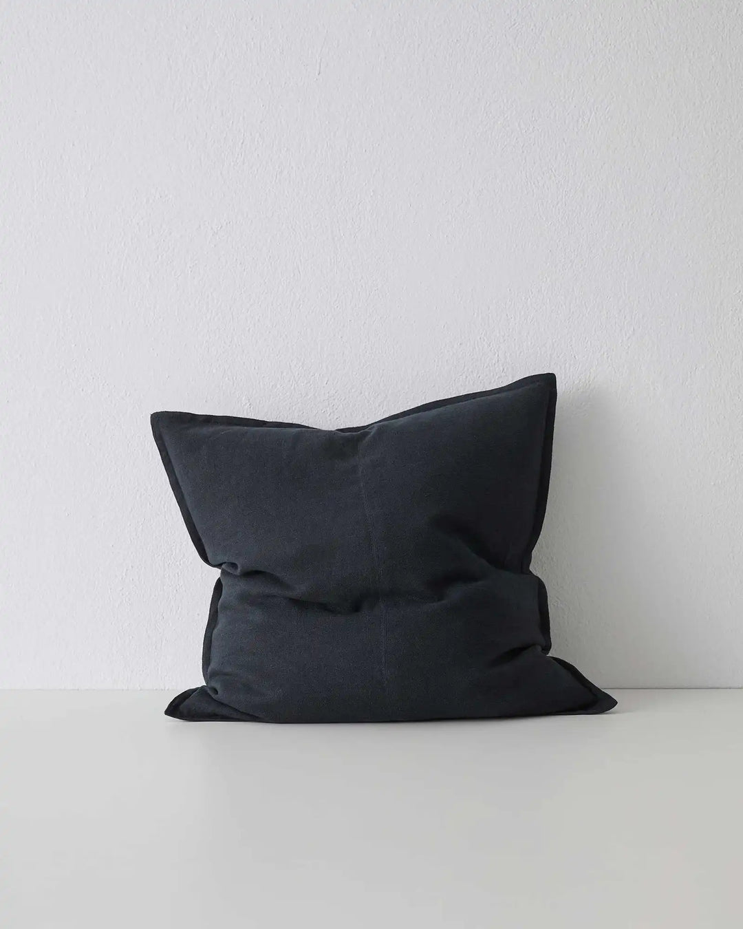 Como Shadow linen cushion in black, 50x50cm, stonewashed European linen with soft matte finish by Weave Home