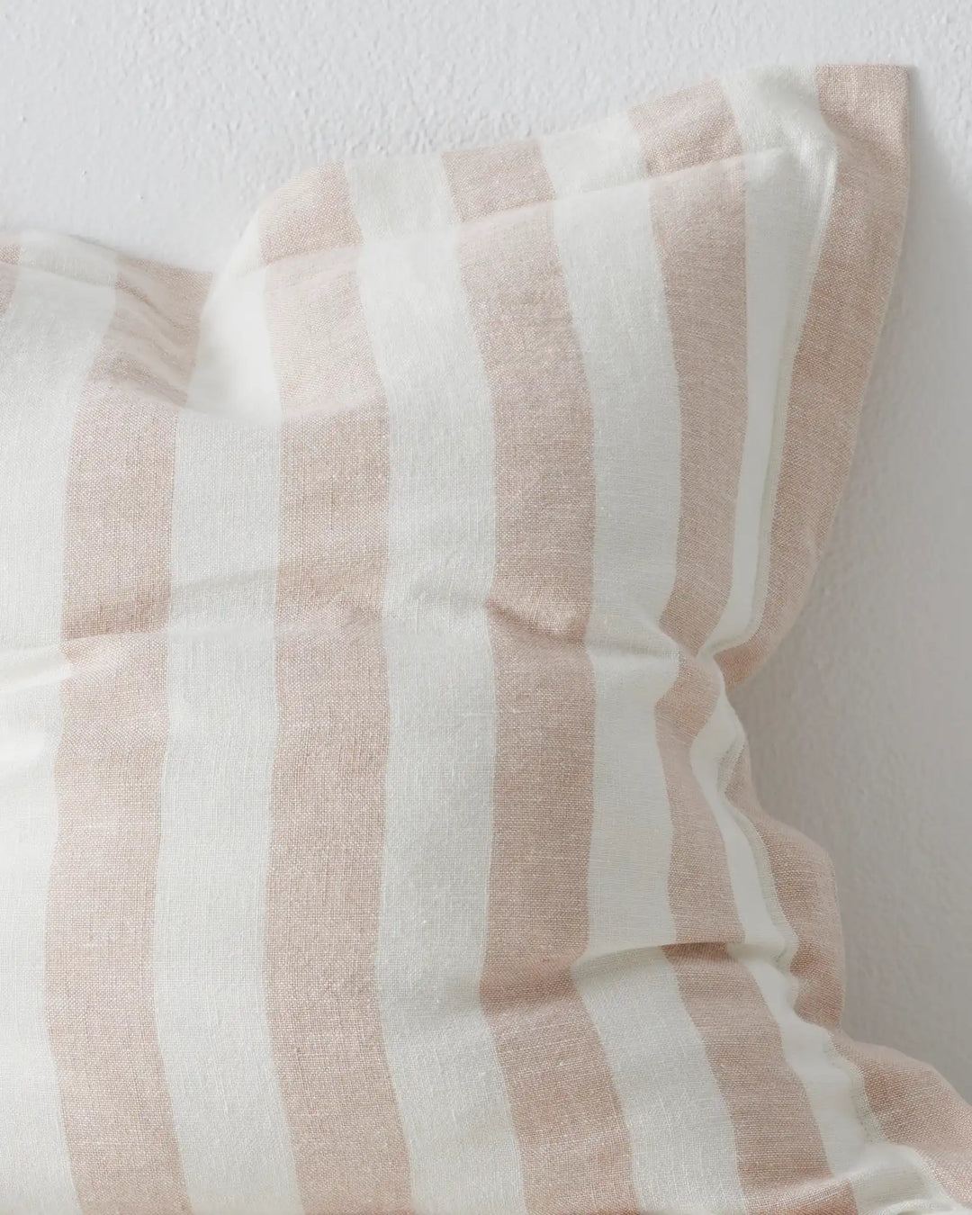 Vito Blush 50x50cm linen cushion with four-centimetre yarn-dyed stripe in soft pink and cream, detail view by Weave Home