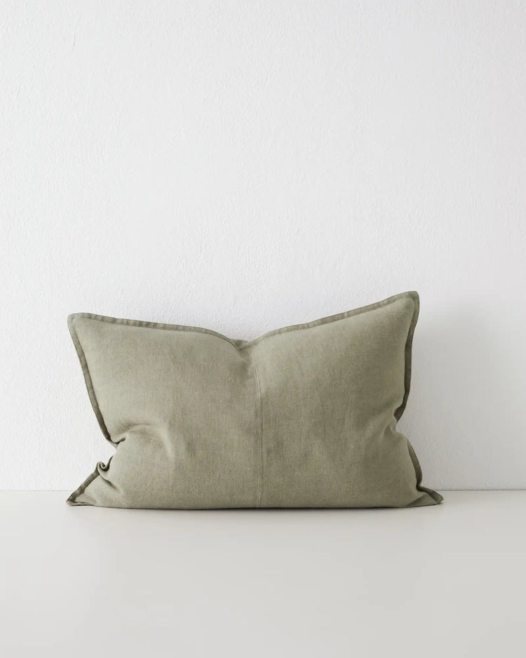 Como Caper linen cushion 40x60cm in soft muted green with contrasting piping, front view, by Weave Home