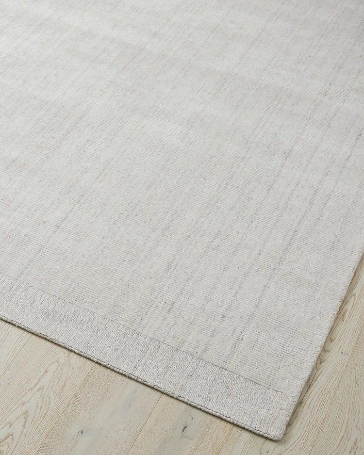 Travertine Marble low-traffic rug, 2m x 3m, viscose blend with hand-woven texture and cotton edging detail by Weave Home