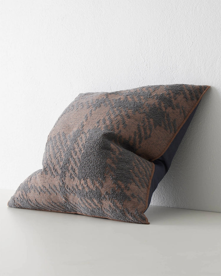 Sienne Dusk 50x50 cushion in mauve with faded denim-blue check texture and overlocked edge detail by Weave Home