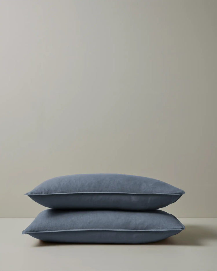 Ravello Pillowcase Set in denim, king size, stacked pair showing top-stitched flanged edge detail, European linen by Weave Home
