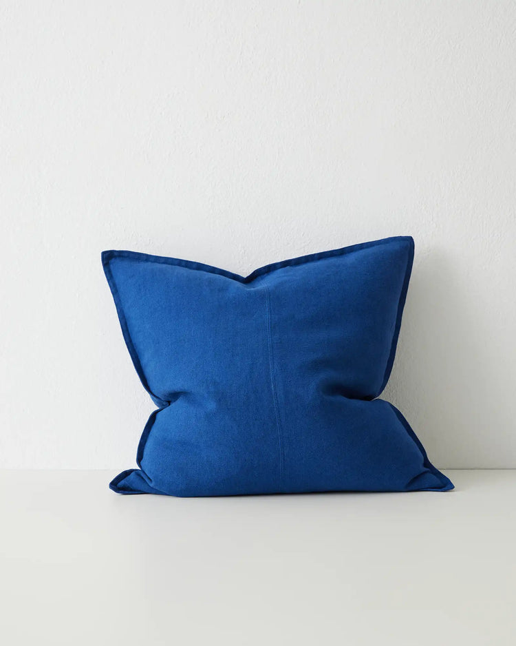 Como Cobalt 60x60 cushion in vibrant blue European linen with piping detail, front view by Weave Home